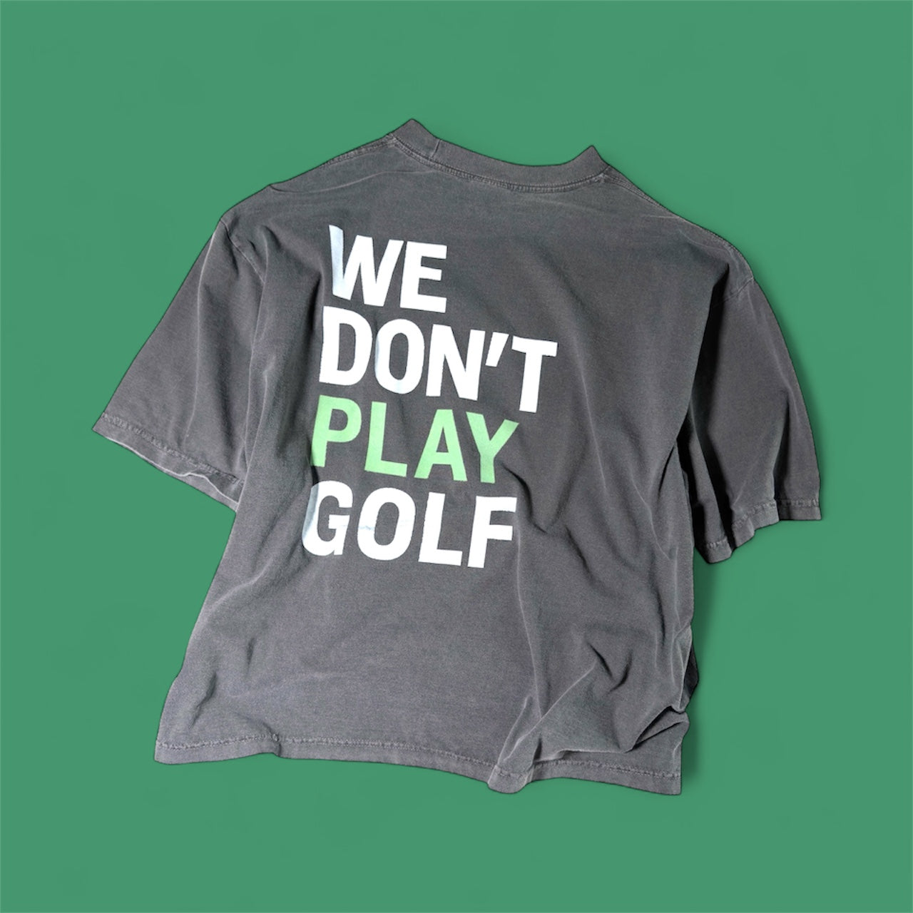 WE DON'T PLAY GOLF HEAVYWEIGHT DROP-SHOULDER T-SHIRT